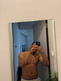 T.