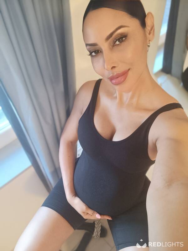 Sexy zwangere vrouw (Foto)